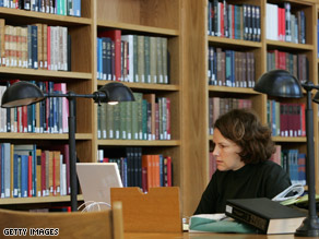 woman studying at Stanford University's Cecil H. Green library
