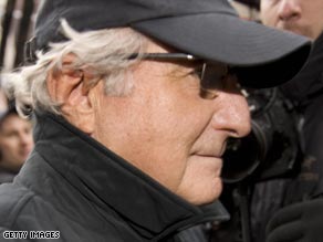 Bernard Madoff strolls down New York's Lexington Avenue after news of the scandal breaks.