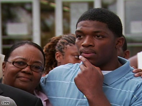 The Rev. Al Sharpton and Mychal Bell's mother, Michelle Bell, lead a 2007 protest march in Jena, Louisiana.