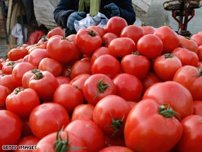 At least 48 people have been hospitalized in connection with a salmonella outbreak in tomatoes.