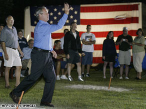 President Bush, shown playing horseshoes in 2004, also enjoys mountain biking.