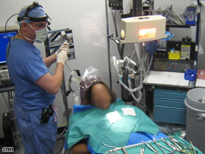 Dr. Steve Kerrigan, left, leads a drug research team at Ireland's Royal College of Surgeons.