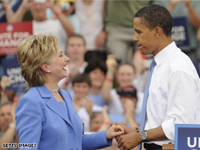 Sens. Hillary Clinton and Barack Obama appear at a unity rally in Unity, New Hampshire, in June.