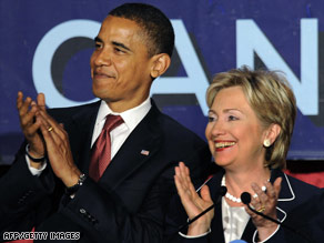 Sens. Barack Obama and Hillary Clinton appears together during a fundraiser in New York Thursday.