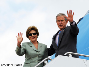 Protesters shout slogans in Seoul, South Korea, on Monday at a rally opposing President Bush's visit.