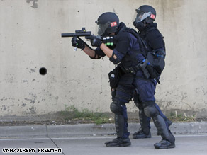 art.police.tear.gas2.cnn.jpg