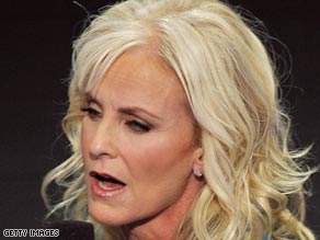 Cindy McCain, wife of  John McCain, stands on the stage at the GOP convention before her speech Thursday.