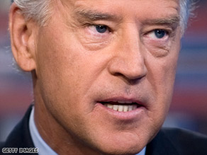 Sen. Barack Obama smiles after Biden's one-word answer at a 2007 debate.