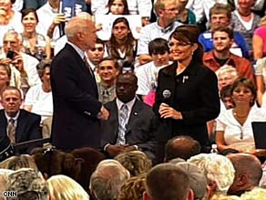 Sen. John McCain and Gov. Sarah Palin at a town-hall meeting in Michigan Wednesday night.