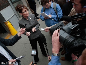 Gov. Sarah Palin speaks with a handful of reporters in Manhattan on Thursday.