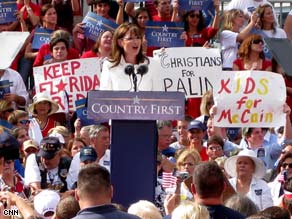 McCain-Palin supporters offer "no lip service" signs at Tuesday's event in Jacksonville.