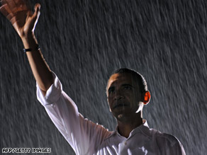 Sen. Barack Obama waves as rain falls on a rally in Fredericksburg, Virginia, in late September.