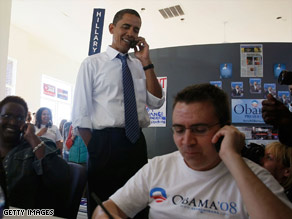 Barack Obama calls a prospective voter from a headquarters in Kansas City, Missouri, on Saturday.