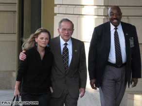 Sen. Ted Stevens leaves the federal courthouse Tuesday evening with his daughter Beth Stevens.