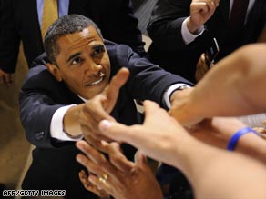 Barack Obama greets supporters at the end of a rally at the Richmond Coliseum in Richmond, Virgina.