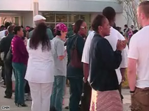 Hundreds of people were in line outside a polling place in Plantation, Florida, before it opened Saturday.