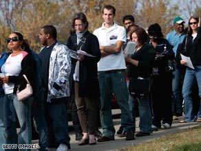 Voters stand in line Sunday outside an early-voting location in Columbus, Ohio.