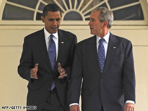 President-elect Barack Obama walks along the White House Colonnade with President Bush on Monday.