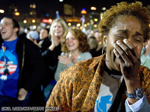 A woman is overcome on November 4 after hearing that Barack Obama had been elected president.