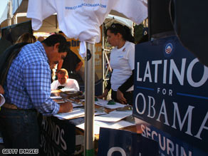 A new voter registers at a Democratic Party booth in September in Denver, Colorado.