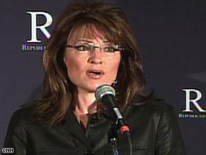 Alaska Gov. Sarah Palin talks to reporters at the GOP governors' group meeting Thursday in Miami, Florida.