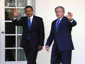 Obama and President Bush wave to reporters as they head into the Oval Office Monday.