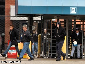 Workers leave a General Motors Powertrain plant in Warren, Michigan, last week.