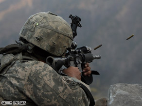 A U.S. soldier fires at Taliban targets during a battle in eastern Afghanistan last month.