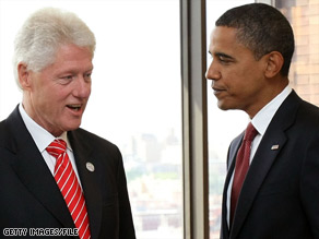 U.S. President-elect Barack Obama, right, with former U.S. President Bill Clinton, left.