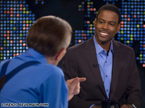 Comedian Chris Rock told Larry King he's proud of Barack Obama's character.