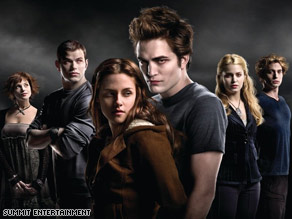 Kristen Stewart and Robert Pattinson, center, star in the film version of "Twilight."