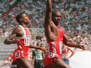Johnson, right, finished several meters clear of archrival Carl Lewis.