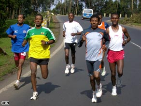 Gebrselassie goes on a training run with companions at home in Addis Ababa.