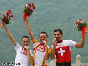 Davide Rebellin, Samuel Sanchez (center) and Fabian Cancellara celebrate their medals on the podium.