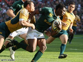 Nokwe holds off a challenge to cross the Wallabies' line for the fourth time.