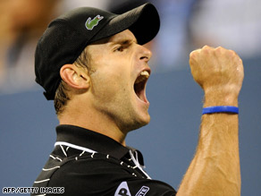 Roddick punches the air after rallying to win the second set against Latvian Gulbis.