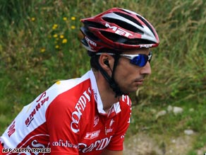 Moncoutie burst clear 20 kilometers from the finish and hung on to win the stage.