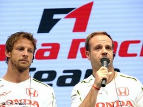 Jenson Button (left) and Rubens Barrichello will be out of a job if Honda confirm their F1 withdrawal.