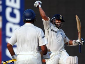 Yuvraj Singh helped keep India on track for a historic win in the first Test against England.