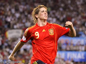 Fernando Torres celebrates after giving Spain the lead on 33 minutes.