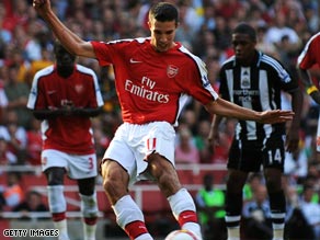 Van Persie fires home a first-half penalty to put Arsenal in front.