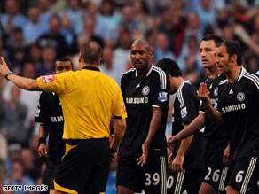Chelsea players appeal to referee Mark Halsey after John Terry's dismissal at the weekend.