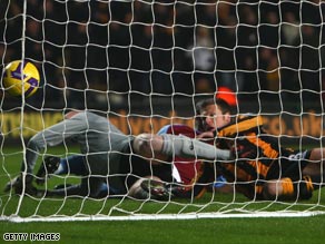 Great escape: Barmby watches the ball cross the line as keeper Friedel and Reo-Coker end up in a tangle.