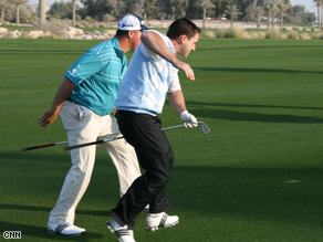 CNN's Justin Armsden threatens to pass on the inside during a re-run of the famous Boo Weekley dash.