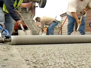 Chicago workers resurface alleys with permeable concrete that cleans rainwater before it runs into Lake Michigan.