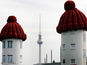 February 2008: Houses were crowned with woollen hats in Berlin as part of a campaign to spread awareness on the refurbishment of housing to save energy.
