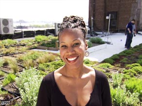 Majora Carter in front of a green roof in the Bronx