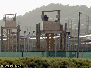 A guard looks over the U.S. military detention facility at Guantanamo Bay, Cuba, in this 2002 photo.
