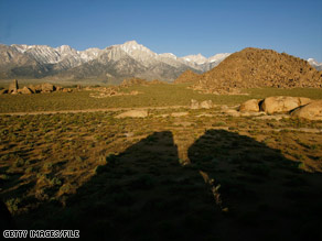 The Sierra Nevada rise above the foothills near Fresno County, California.