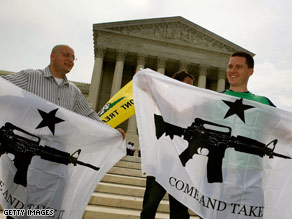 Ariel Sarousi, left, and Steve Bierfeld of Arlington, Virginia, celebrate the court's ruling Thursday.